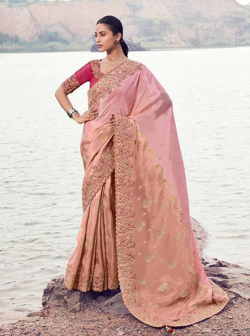 Pink faux tissue silk saree with intricate woven embroidery, khatli work, and sequins