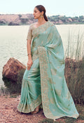 Light sky blue faux tissue silk saree with intricate sequins and embroidery work