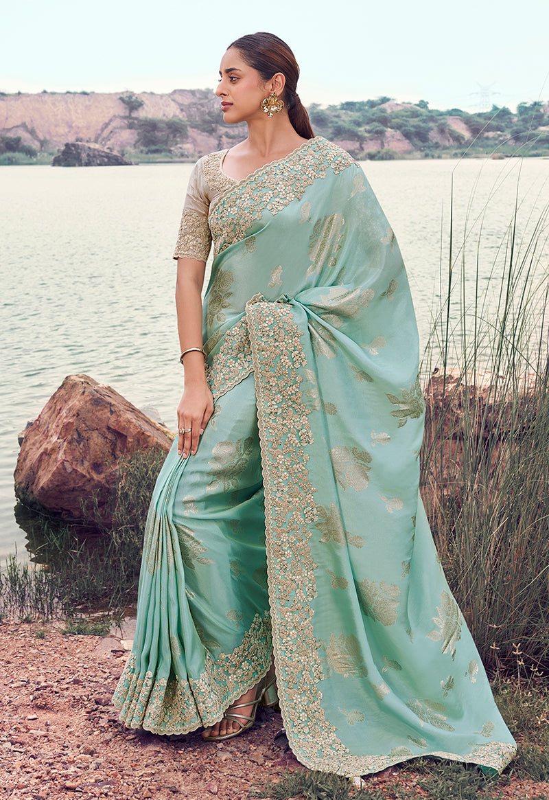 Light sky blue faux tissue silk saree with intricate sequins and embroidery work