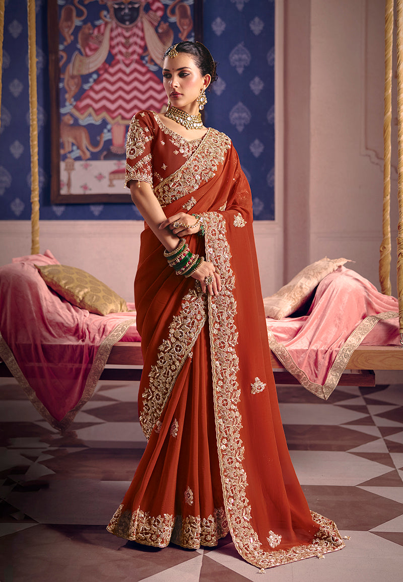 Rust viscose zari tissue silk saree with detailed embroidery