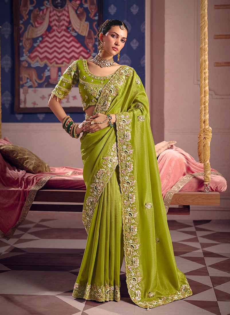 Parrot green viscose zari tissue silk saree with intricate embroidery
