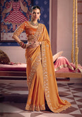 Orange viscose tissue silk saree with intricate zari embroidery