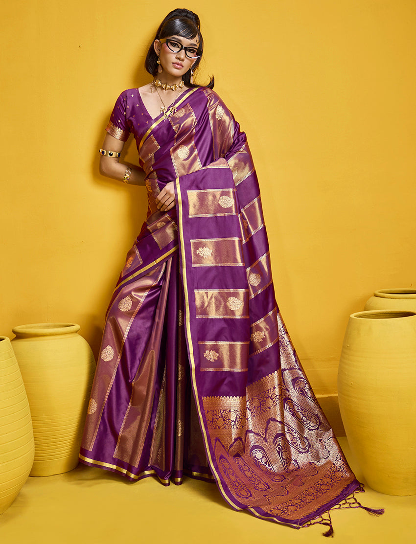 Purple satin silk handloom saree with a golden zari border and decorative lace.
