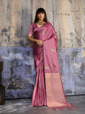 Pink satin silk blend saree with intricate woven motifs and a luxurious golden zari pallu