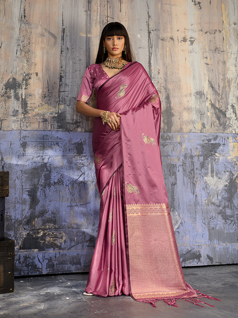 Pink satin silk blend saree with intricate woven motifs and a luxurious golden zari pallu