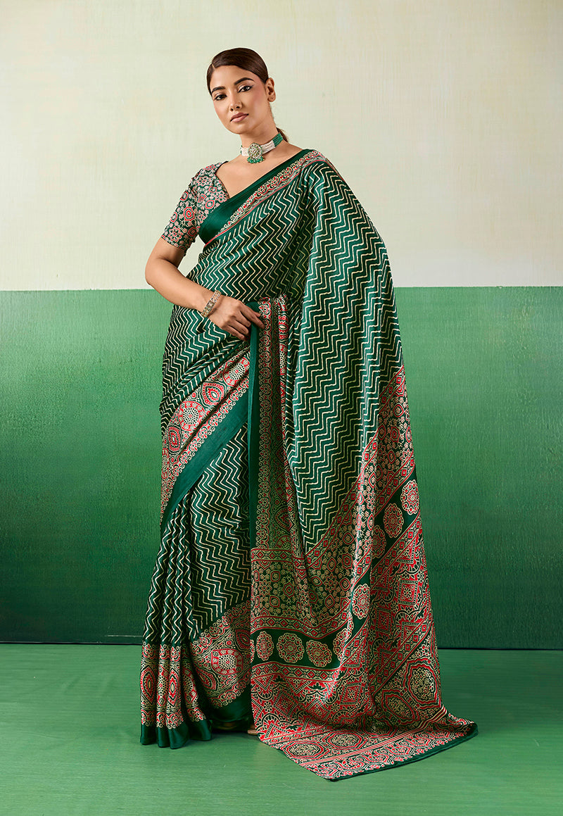 Green Faux Satin saree featuring Ajrakh-inspired traditional print patterns with a matching blouse.