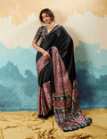 Black modal satin saree featuring detailed ethnic Ajrakh motifs and a silky finish