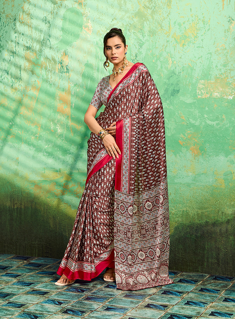Brown faux satin saree featuring traditional Ajrakh prints and a lustrous finish