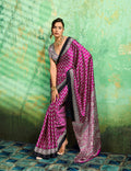 Magenta Ajrakh print faux satin saree with intricate traditional patterns