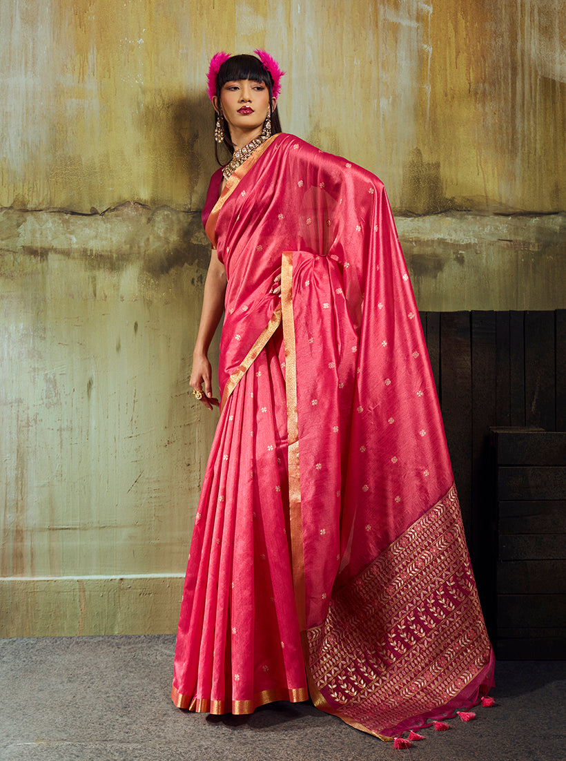 Pink faux tussar silk saree with woven motifs and a metallic zari pallu.