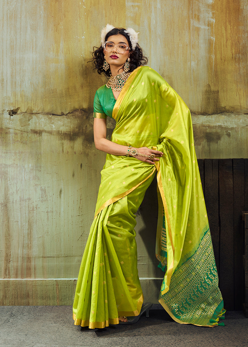 Parrot green faux Tussar silk saree with golden zari woven pallu
