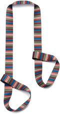 Adjustable yoga mat strap and carrier in use for carrying a rolled yoga mat