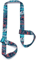 Adjustable yoga mat strap and carrier in use for carrying a rolled yoga mat