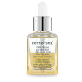 Bottle of Restorsea 24kt Liquid Gold Face Oil featuring a golden oil texture