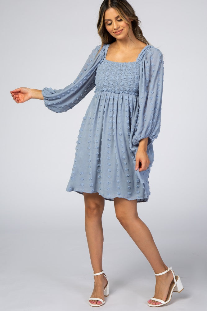 Light blue chiffon midi dress with textured dots, smocked bust, square neck, and 3/4 bubble sleeves