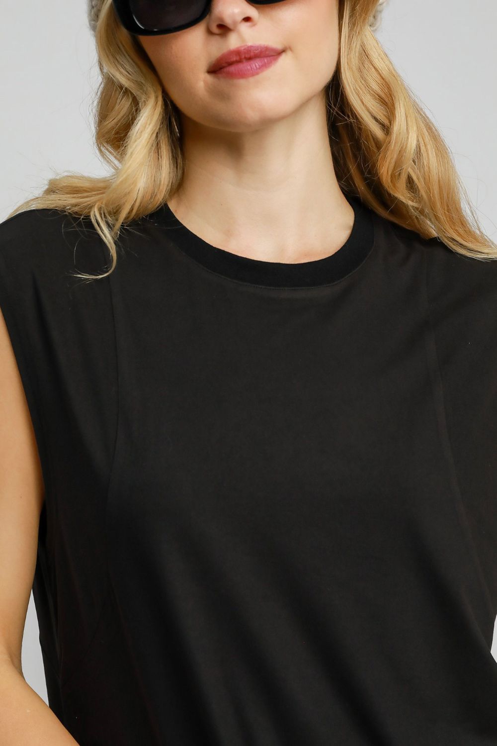 Minimalist Black Sleeveless High-Low Mini Dress with Curved Hem