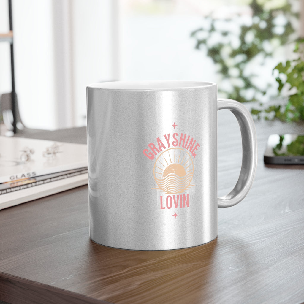 Personalized ceramic coffee mug with a shiny metallic gold or silver finish and ergonomic C-handle