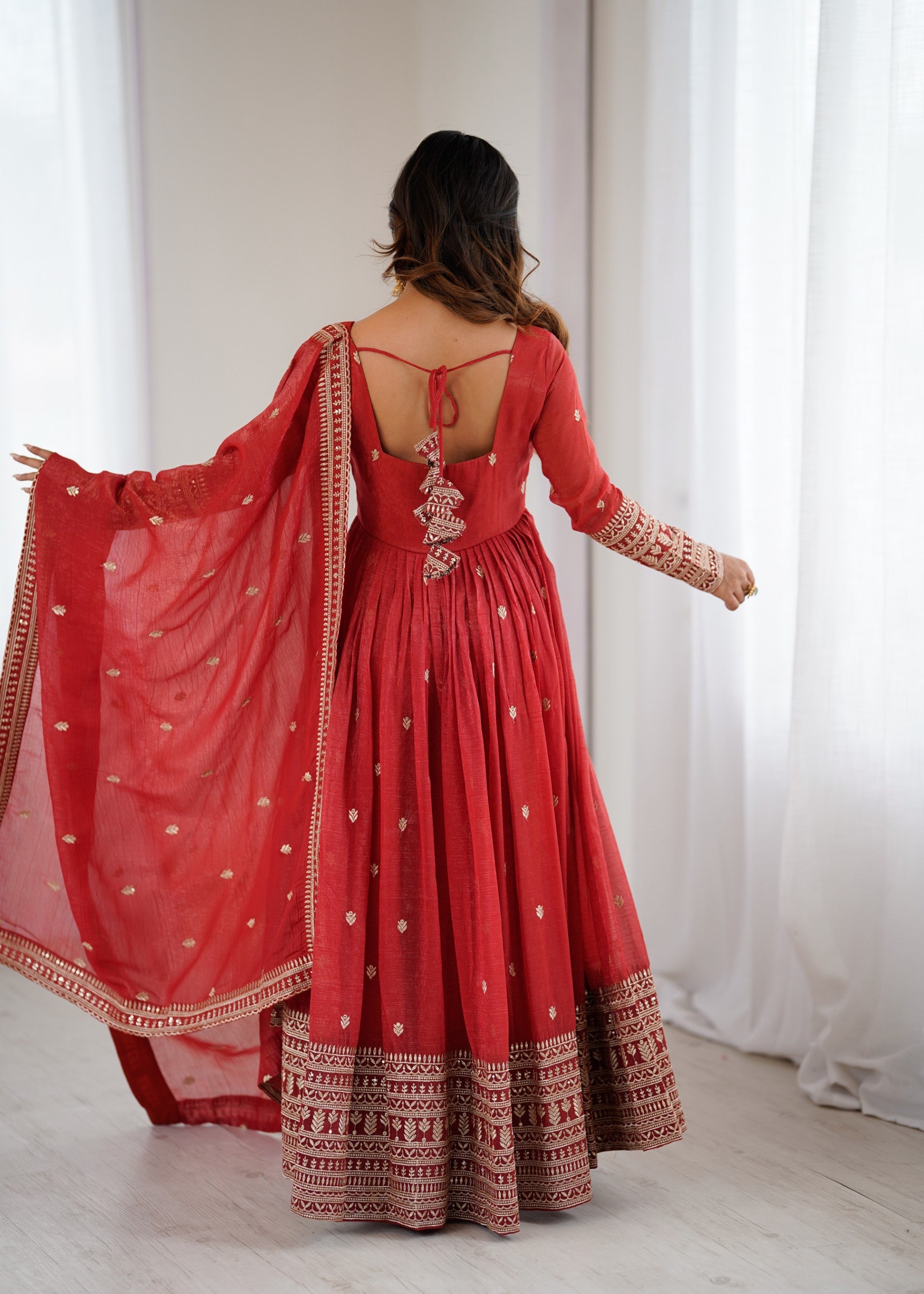 Rust Silk Anarkali Gown with Jari and Sequence Embroidery