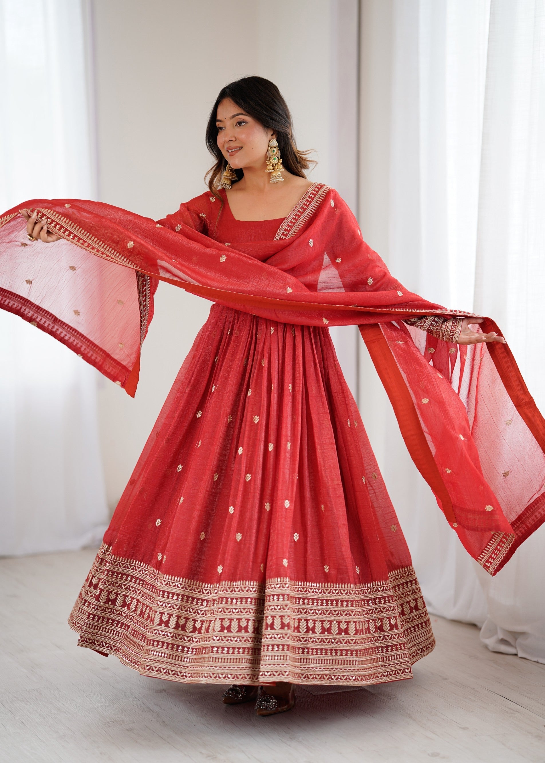 Rust Silk Anarkali Gown with Jari and Sequence Embroidery