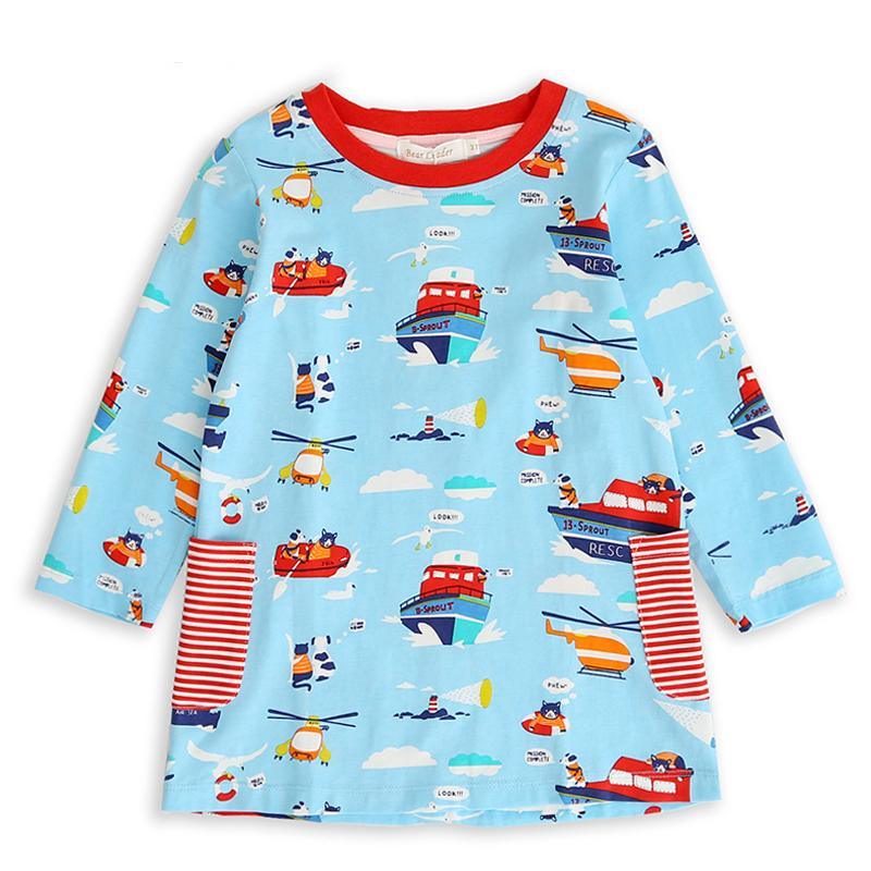 Toddler girl wearing a soft, long-sleeve cartoon-themed suspender dress for autumn.