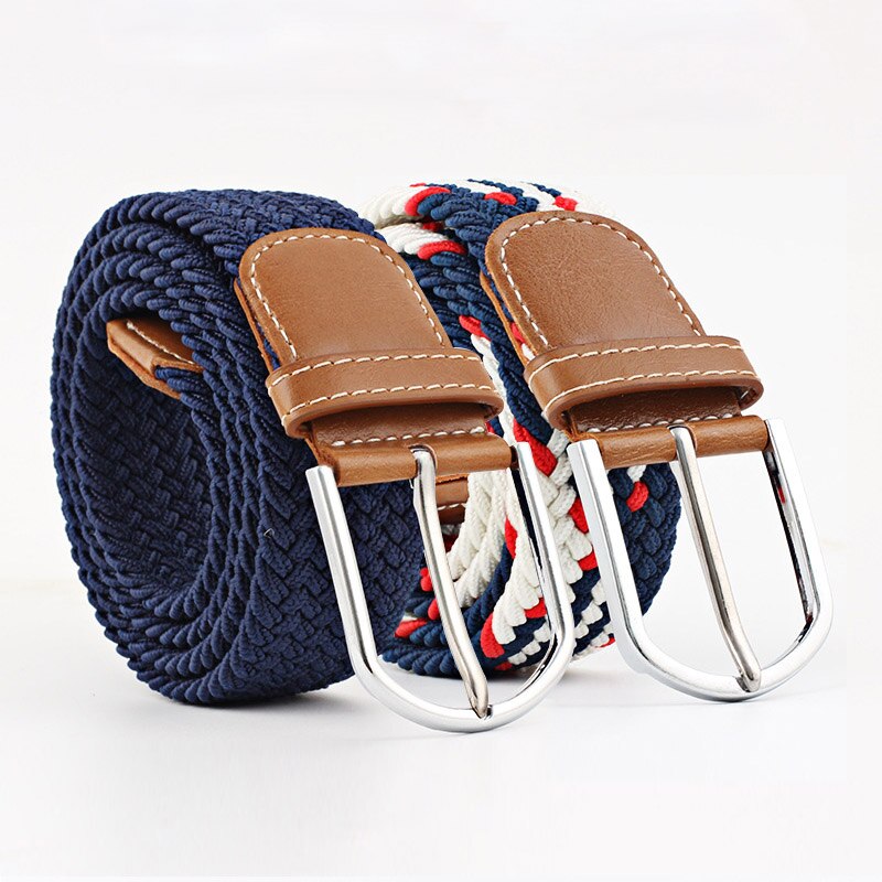 Two rolled elastic woven belts with brown faux leather tips and silver-tone metal buckles, one in navy blue and one in red, white, and blue stripes, displayed on a white background. Another image shows multiple color variations of the same elastic woven belts laid out.