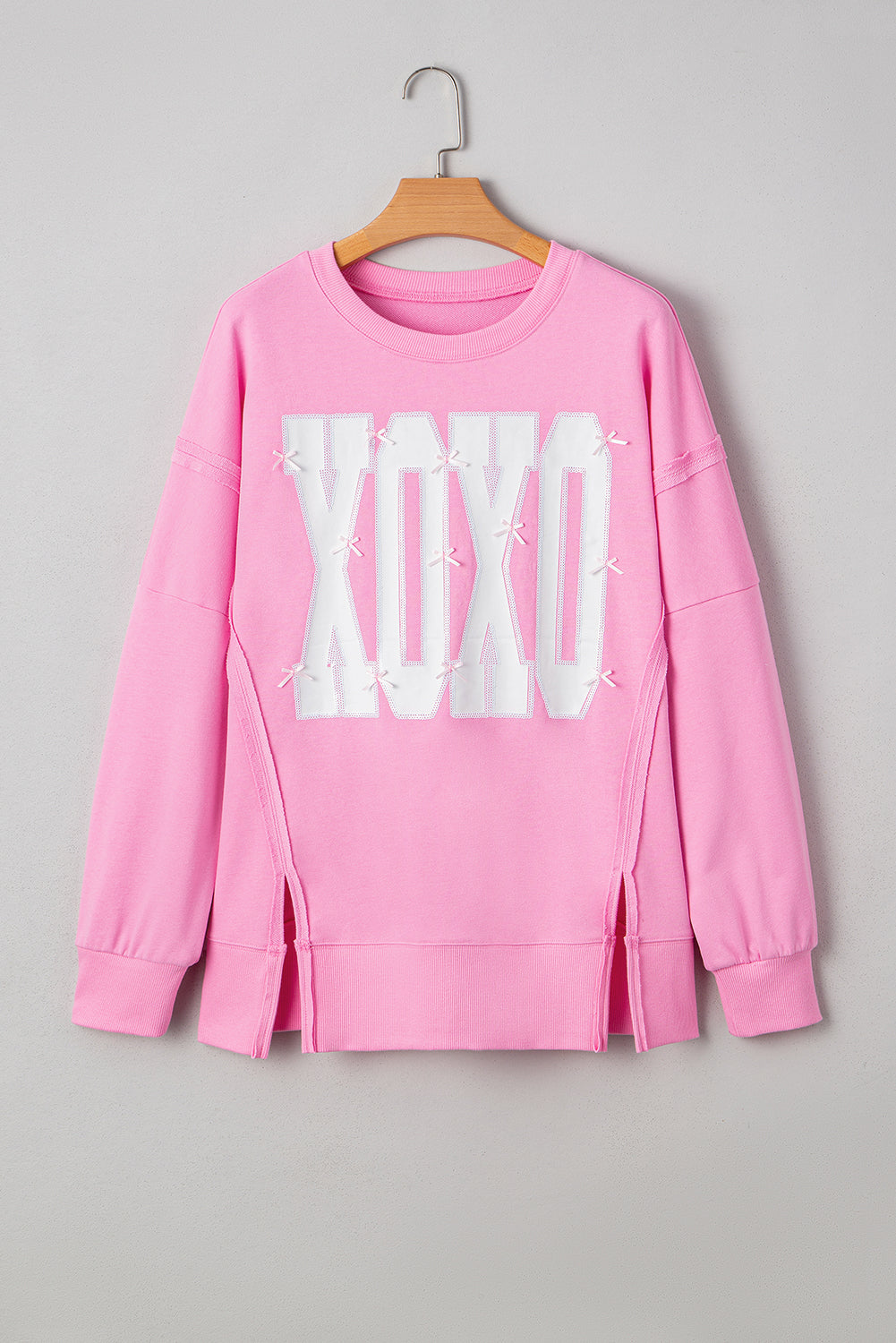 Pink Bow Sequin XOXO Baggy Sweatshirt | Exposed Seam Detail
