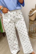 Whitley Patch Cotton Shift Pants in a black and white polka dot print with scalloped pockets.
