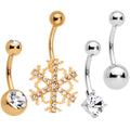 Set of four belly rings including gold-tone snowflake design, plain gold-tone, and silver-tone styles.