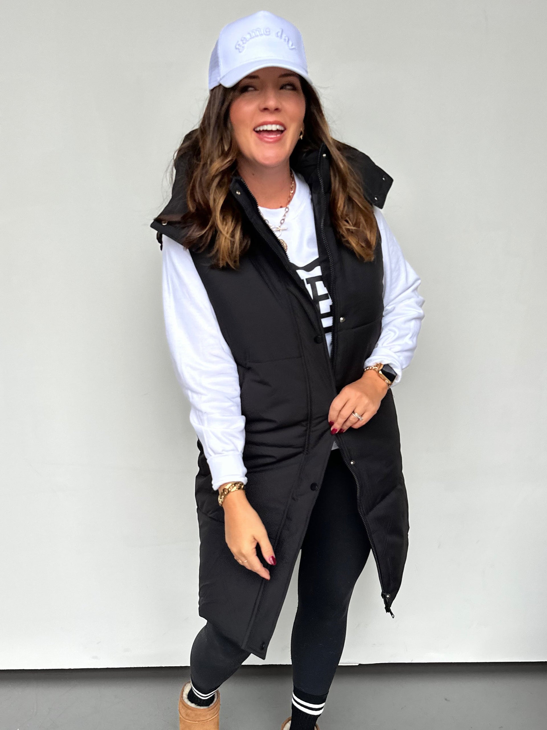 Long Black Puffer Vest with Removable Hood and Dual Closure