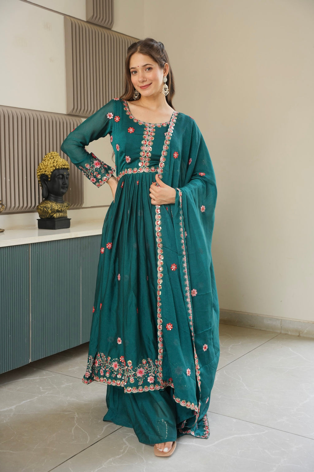 Rama color Noha Crush Silk Anarkali kurta with heavy embroidery and sequins paired with a matching sharara and dupatta