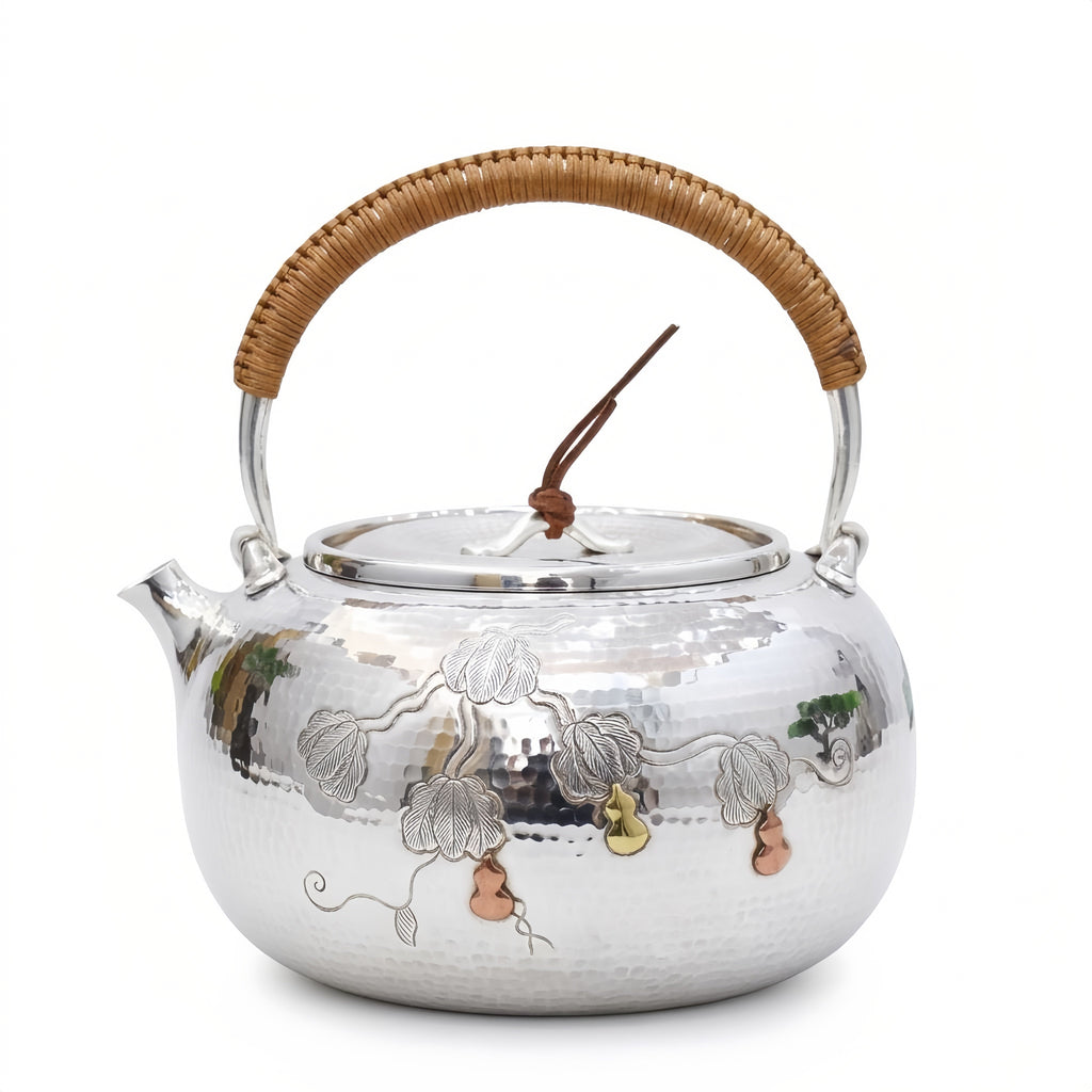 Pure 999 Fine Silver Handcrafted Hammered Silver Teapot with Gourd Vine Relief and Rattan Handle - Handicraft