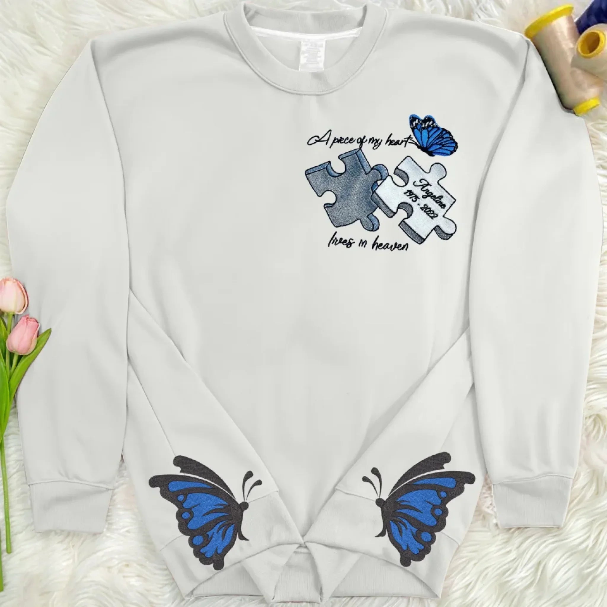 Personalized Memorial Side Bow Embroidered Sweatshirt - Memorial Gift Idea For Loss Of Mom/Dad - A Piece Of My Heart Lives In Heaven