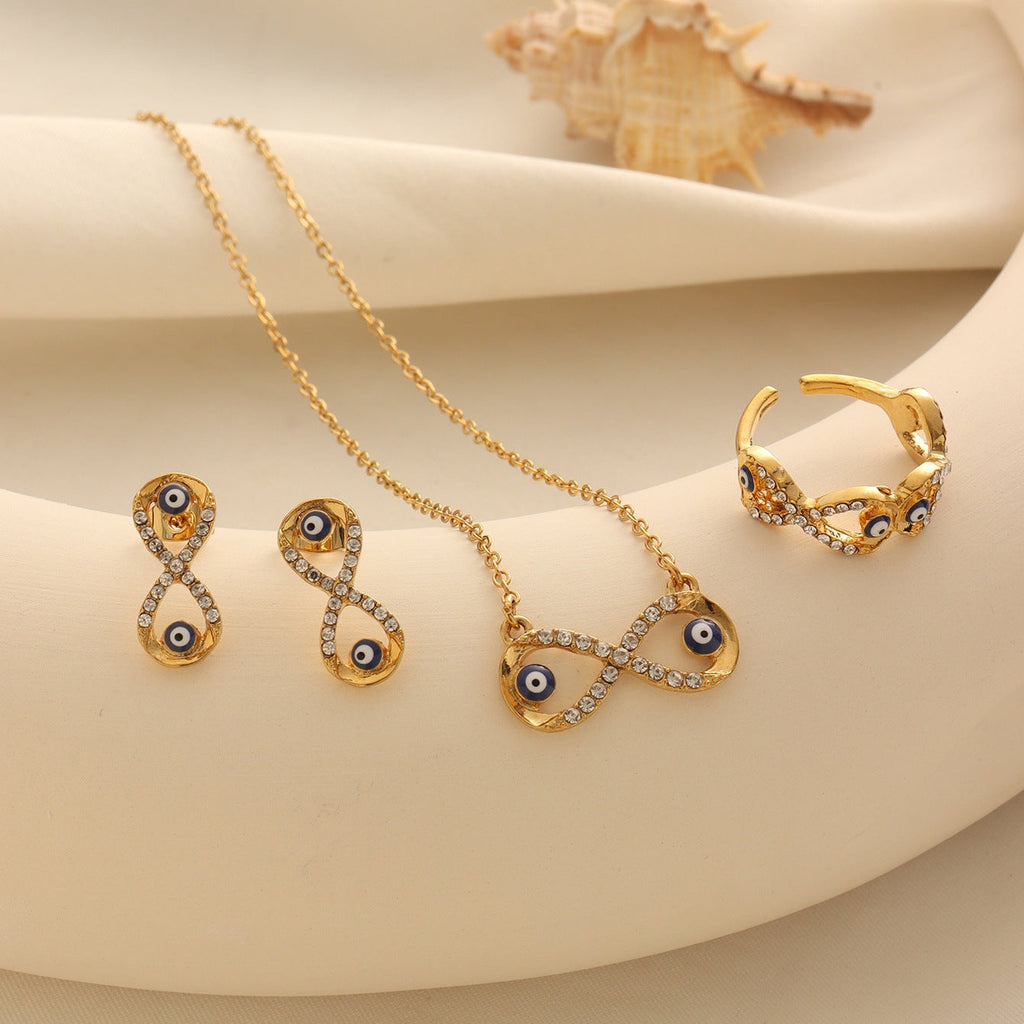 Evil Eye Jewelry Set with White Crystal Accents in Gold Tone