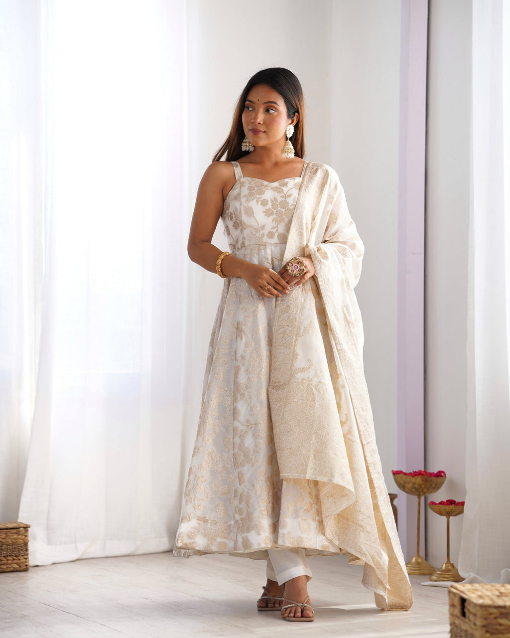 White Banarasi Jacquard Dola Silk Anarkali Gown with backless dori pattern, pants, and dupatta