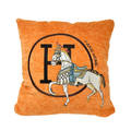 Orange horse-themed throw pillow cover on a neutral sofa