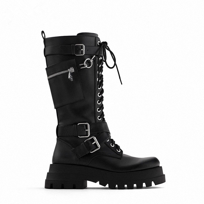 A pair of black lace-up knee-high platform motorcycle boots with silver chain details, buckles, and a side zipper pocket, shown against a white background.