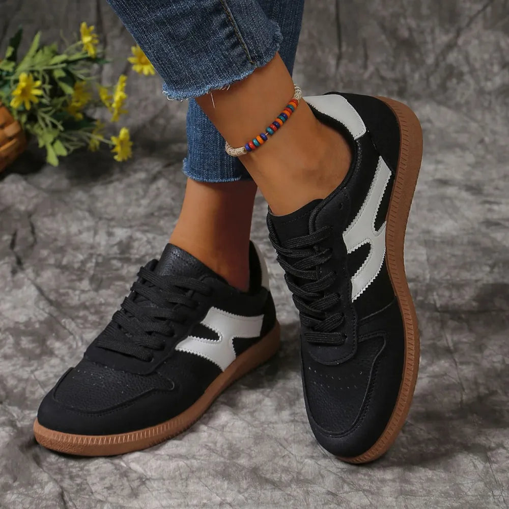 Classic retro-style lace-up sneakers with round toe and contrast details