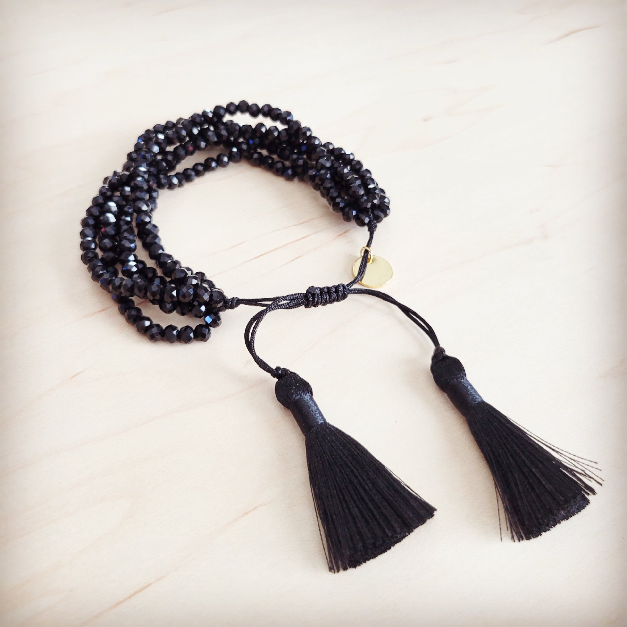 Midnight Multi-Strand Faceted Black Bead Tassel Bracelet - Image 3