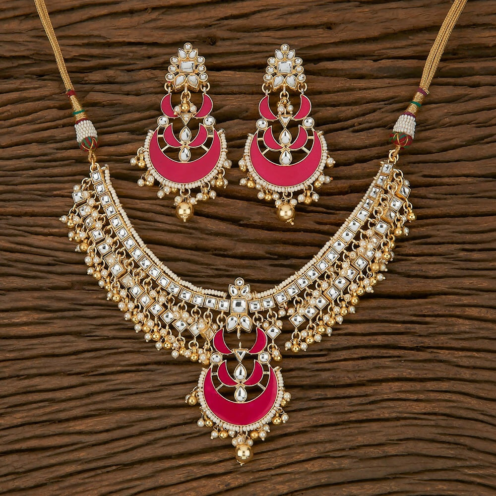 Elegant Golden White Rani necklace set with Kundan pearls and onyx stones