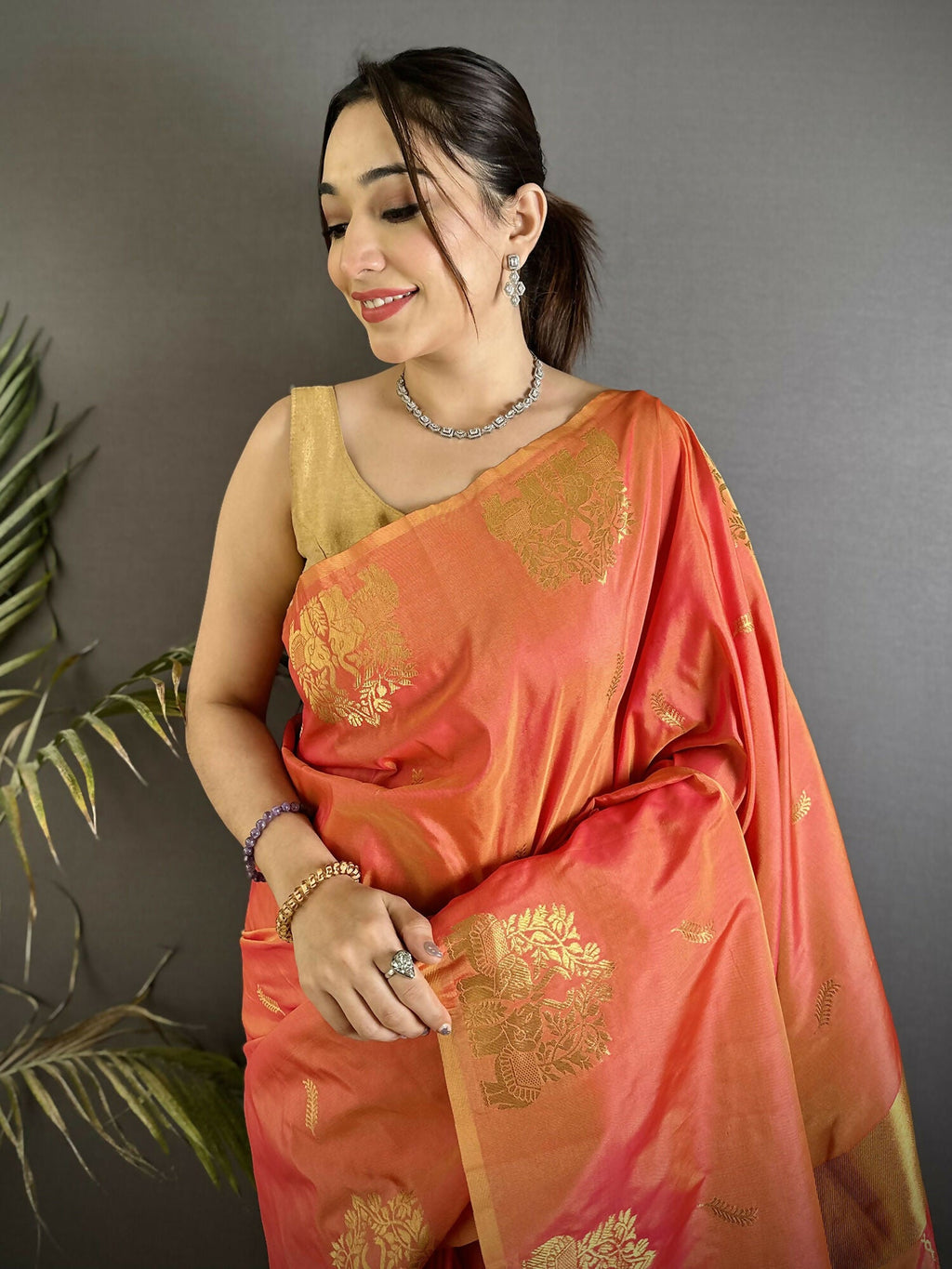 Orange Soft Silk Banarasi Saree with Intricate Zari Motifs
