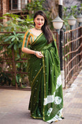 Mehndi green Chanderi cotton saree with intricate block print design and matching unstitched blouse