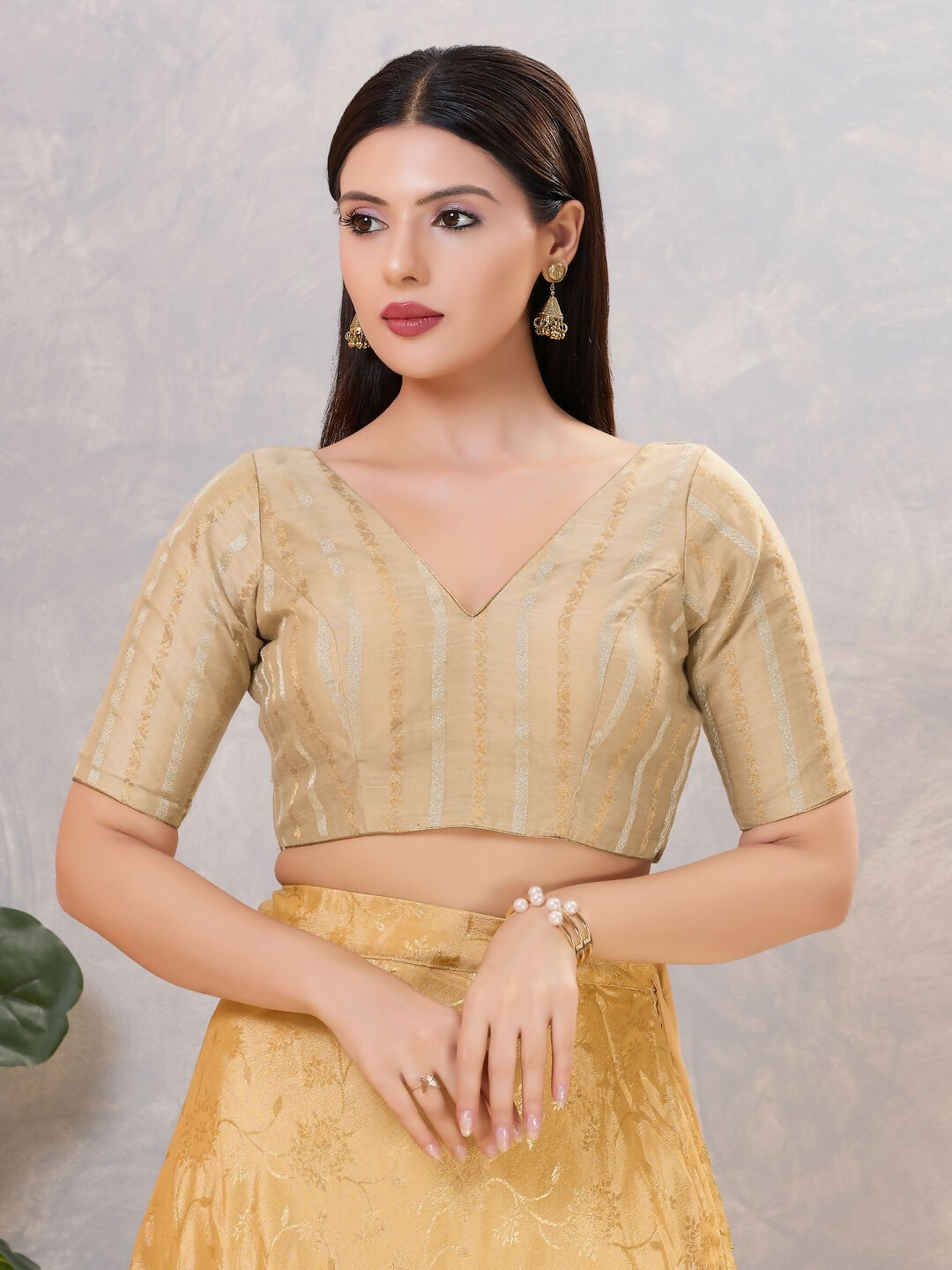 Women's gold cotton blend stitched blouse, solid pattern for saree styling
