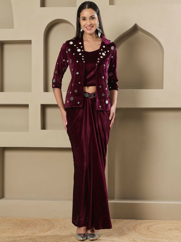 Elegant wine-colored velvet dress featuring detailed hand embellishments and three-quarter sleeves.