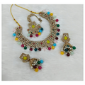 Multi-stone statement necklace set with matching drop earrings on a clean background