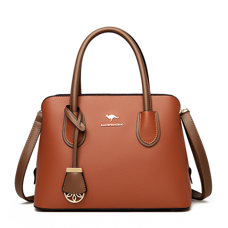 Spacious Leather Diaper Tote Bag with Crossbody Strap for Parents