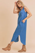 Blue cotton midi tank dress with a round neck and practical side pockets.