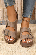 Taupe faux suede platform slippers with adjustable wide buckles and molded footbed