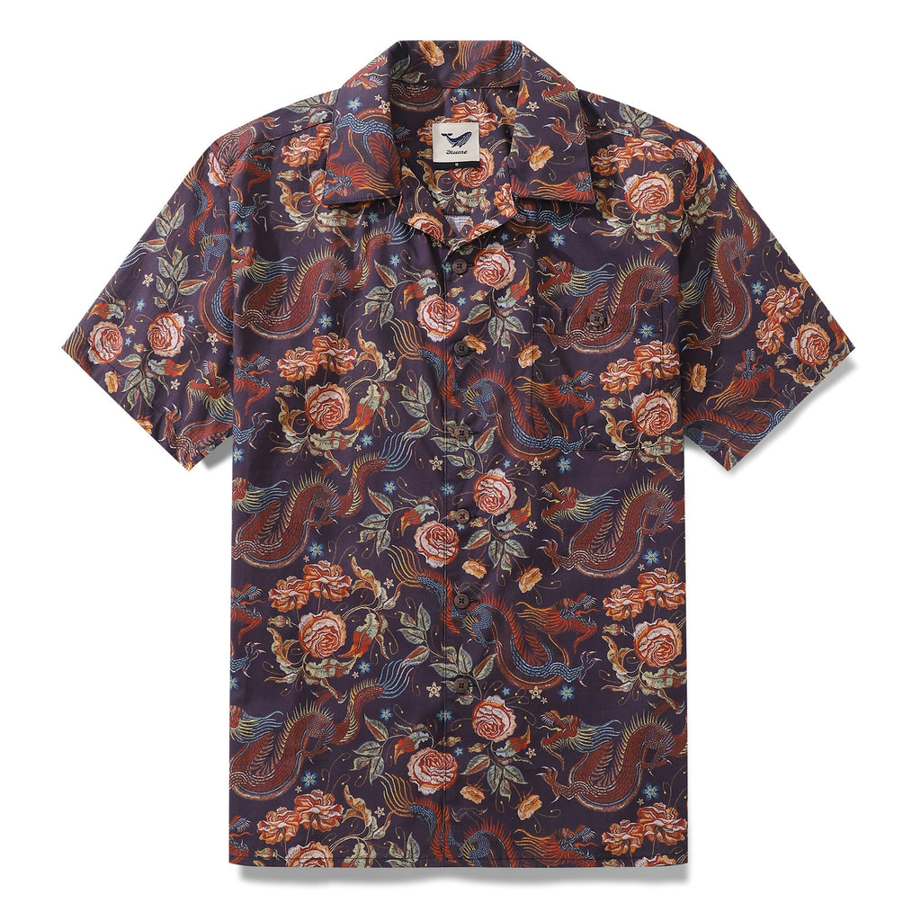 Close up of a dragon-patterned camp collar shirt in dark-purple, orange, and blue.