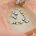 Exquisite white Polki Kundan Jewellery Set with copper base detailing for traditional occasions