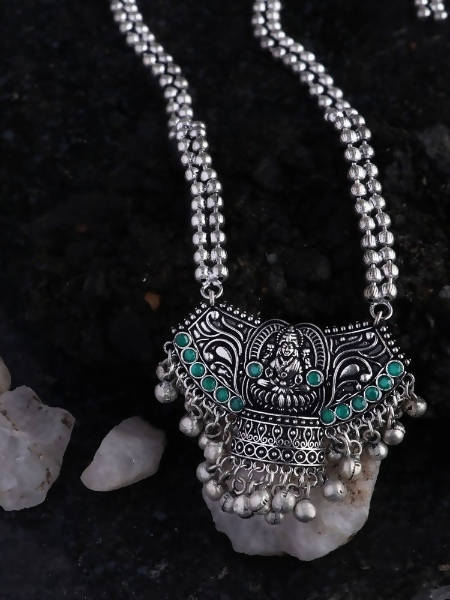 Laxmi Mata oxidised silver long necklace adorned with elegant green stones.